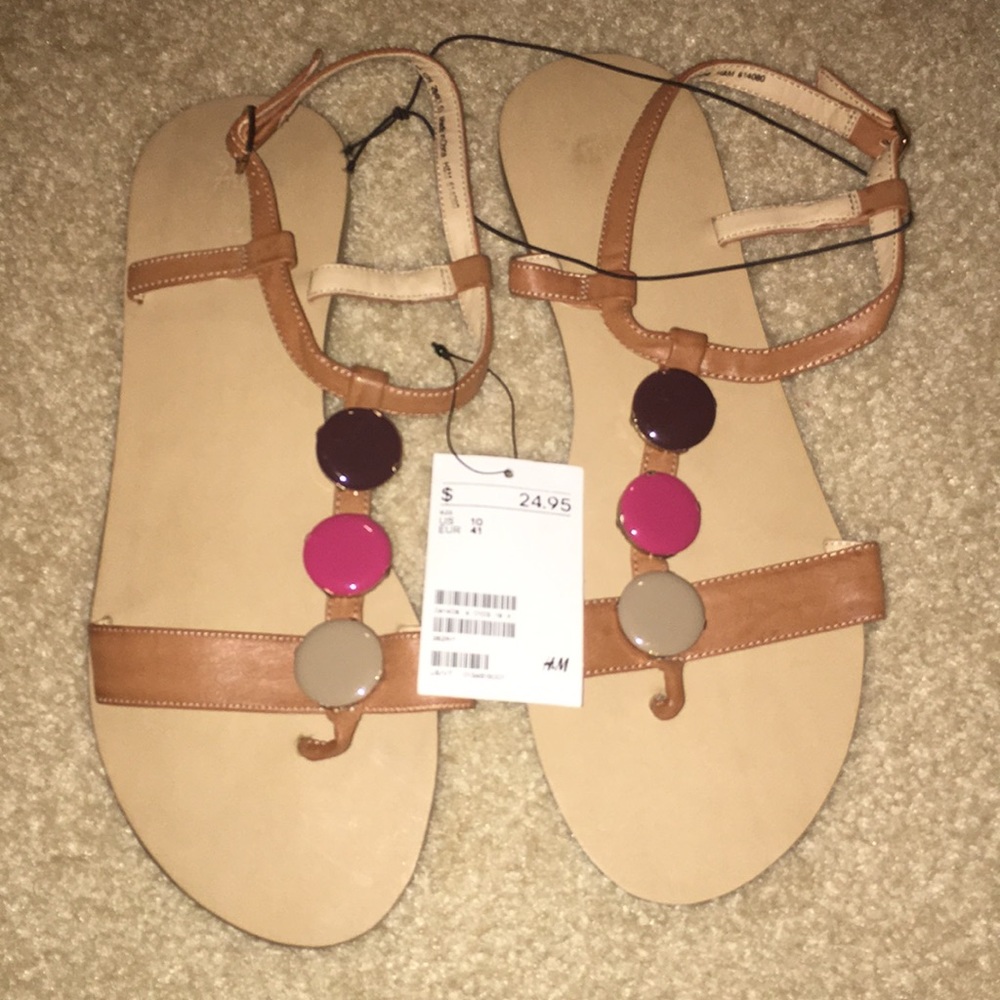 Brown sandals never worn. Size 10.